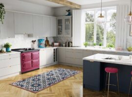 The AGA eR7i offers the best of all worlds - it is the first time a 100cm cast-iron AGA cooker has come complete with a conventional fan oven alongside the two cast-iron ovens.